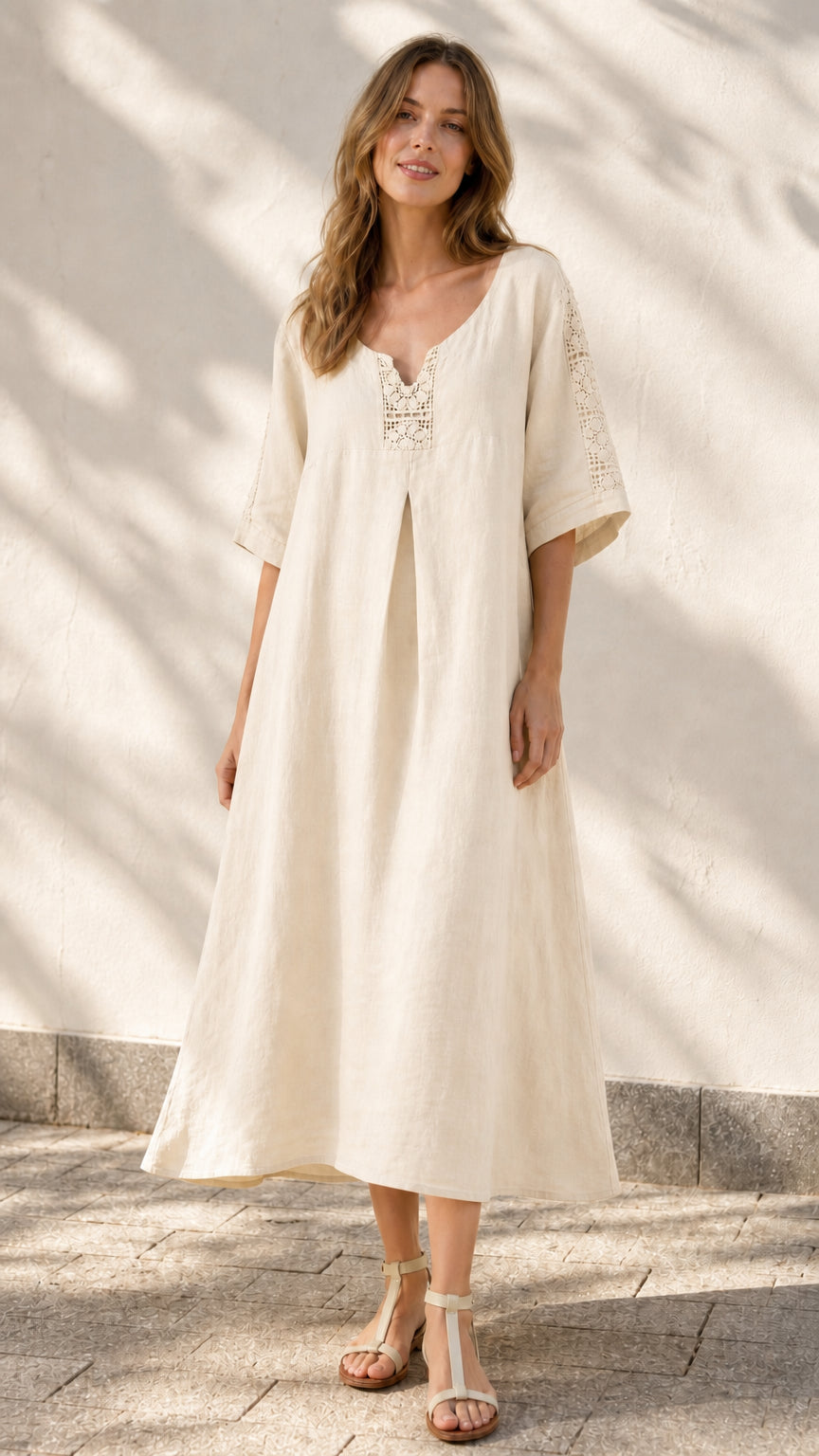Front view of model wearing off-white midi dress