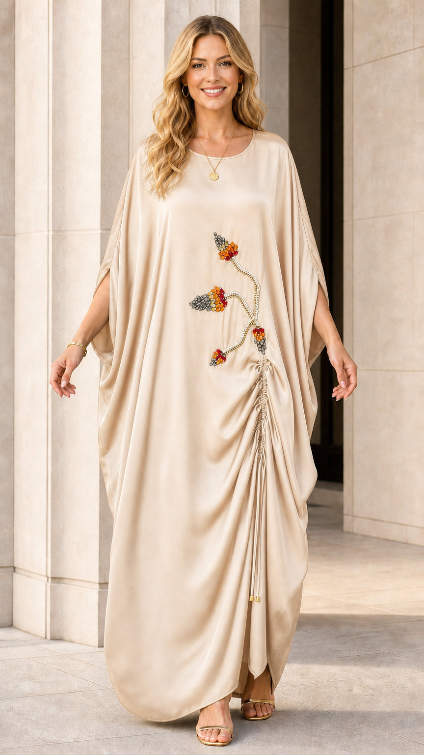 Model wearing champagne kaftan maxi dress