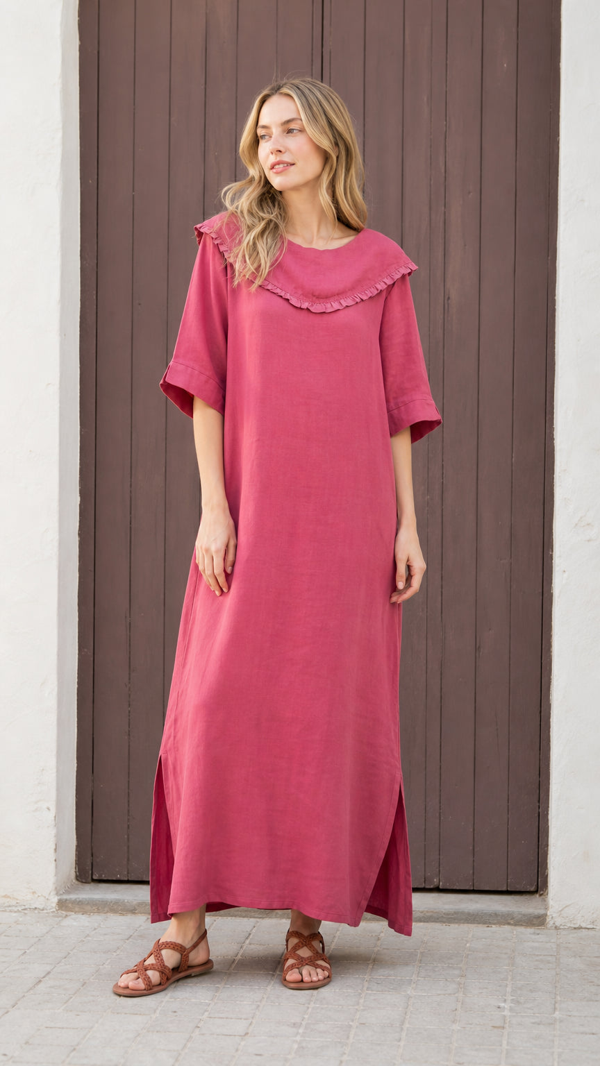 Front view of woman wearing rose pink ruffled sailor collar maxi dress