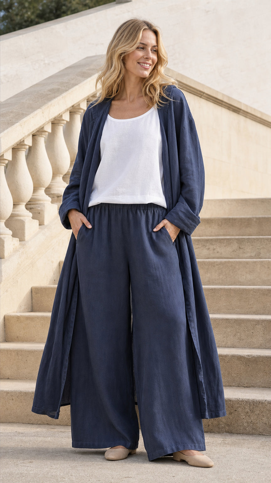 Front view of model wearing Navy Blue hooded long cardigan and wide-leg pants set