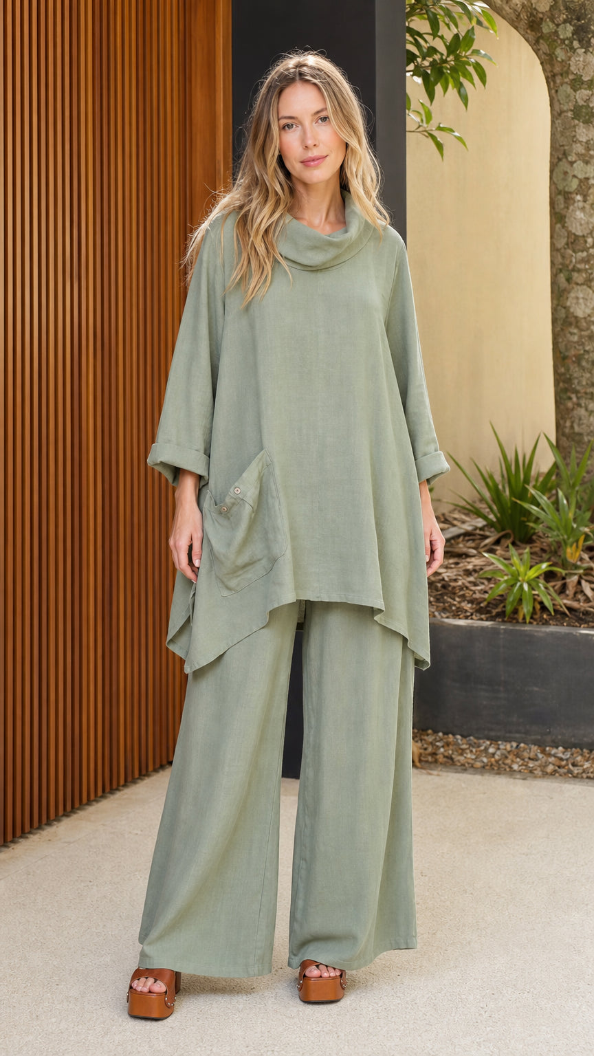 Front view of model wearing sage green cowl neck tunic and wide leg pants set