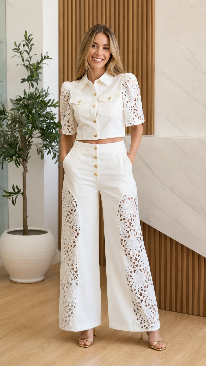 Front view of model wearing white eyelet crochet two-piece set