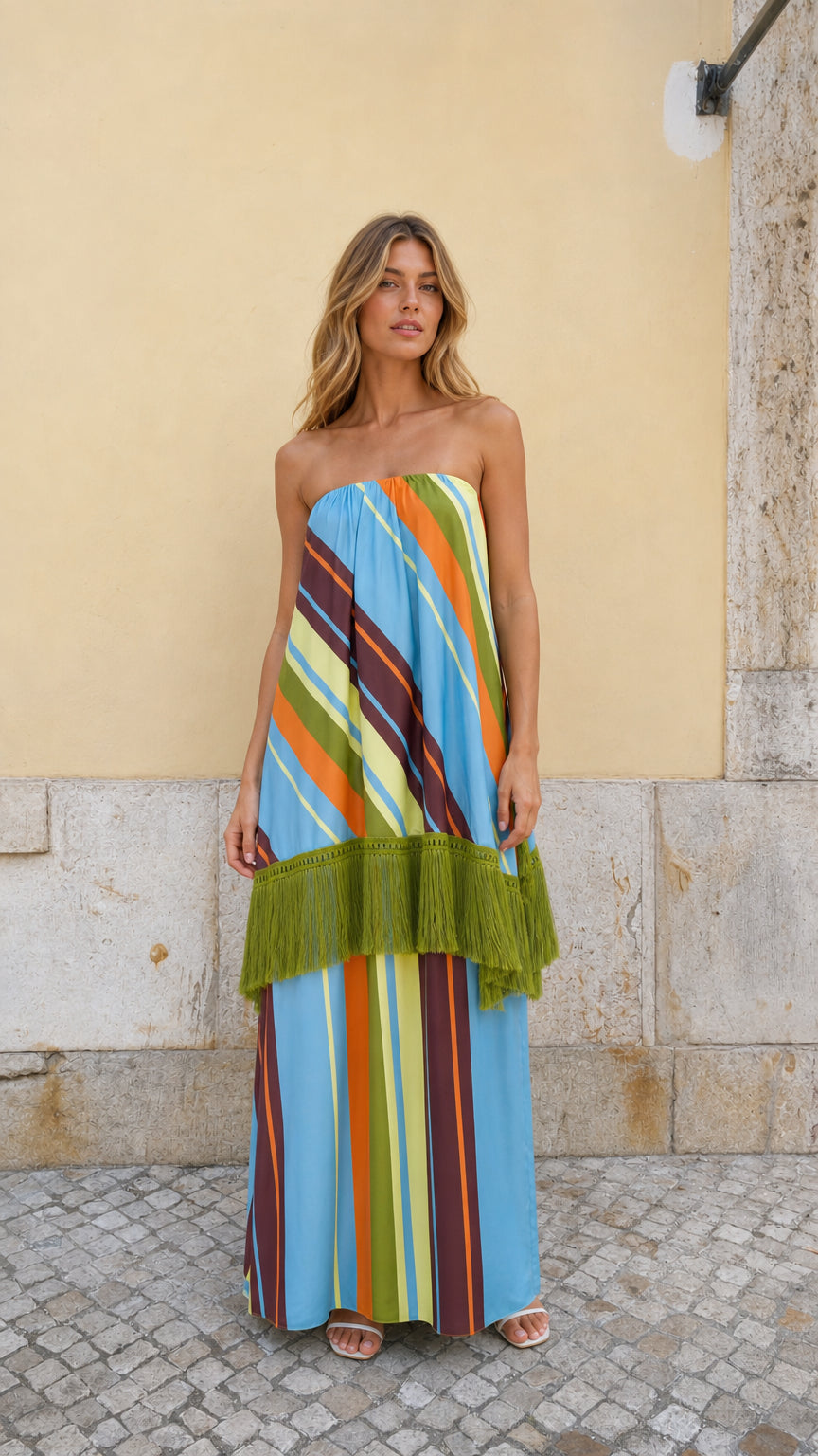 Front view of model wearing Blue Multi striped strapless fringe maxi dress