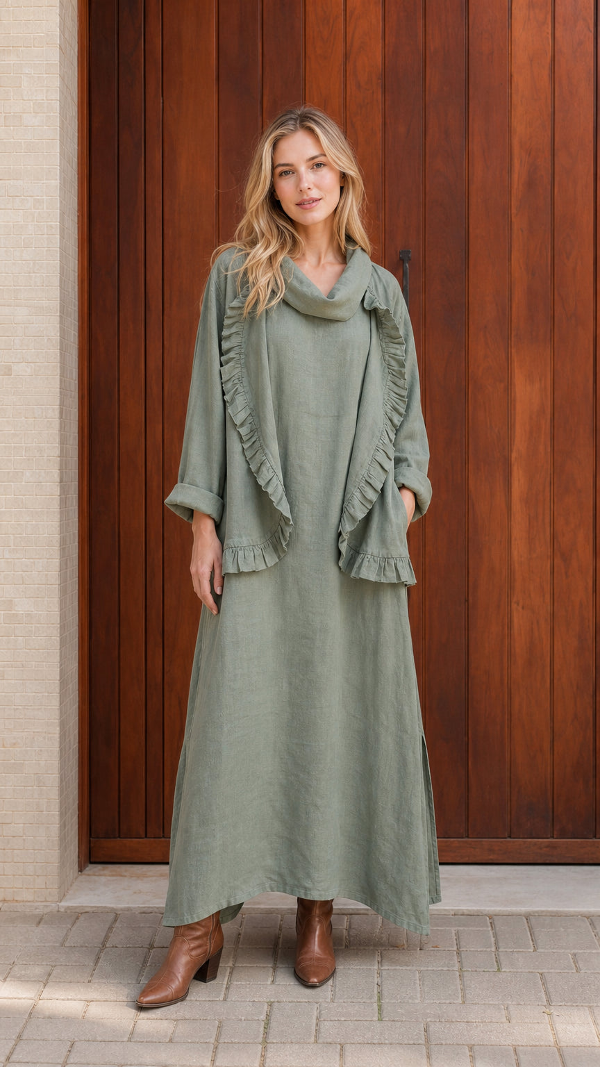 Model wearing sage green ruffled cowl neck top and maxi skirt set from front