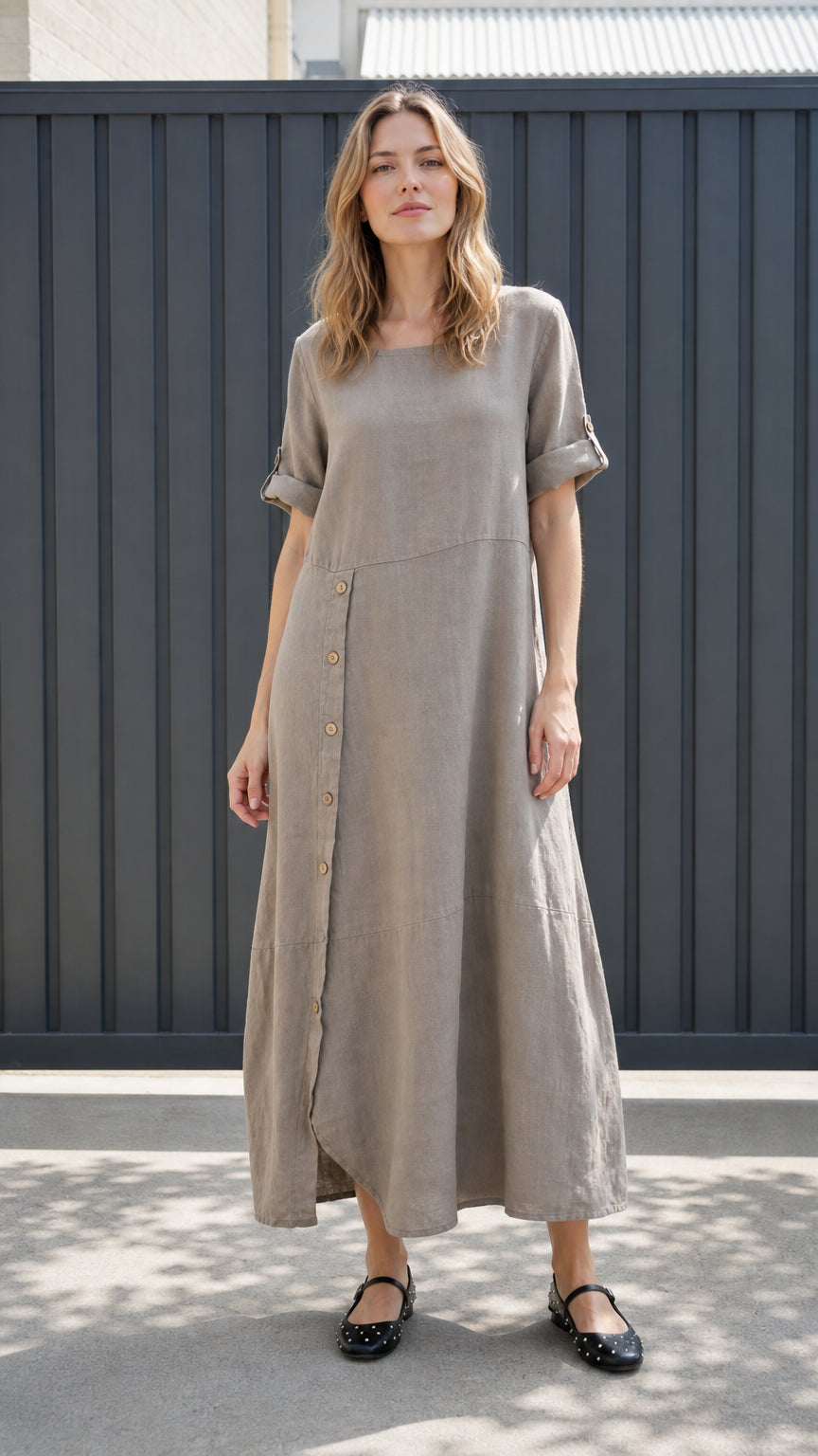 Front view of taupe asymmetrical button-front maxi dress with roll-up sleeves