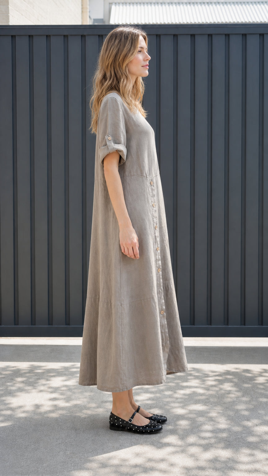 Side profile view of taupe maxi dress
