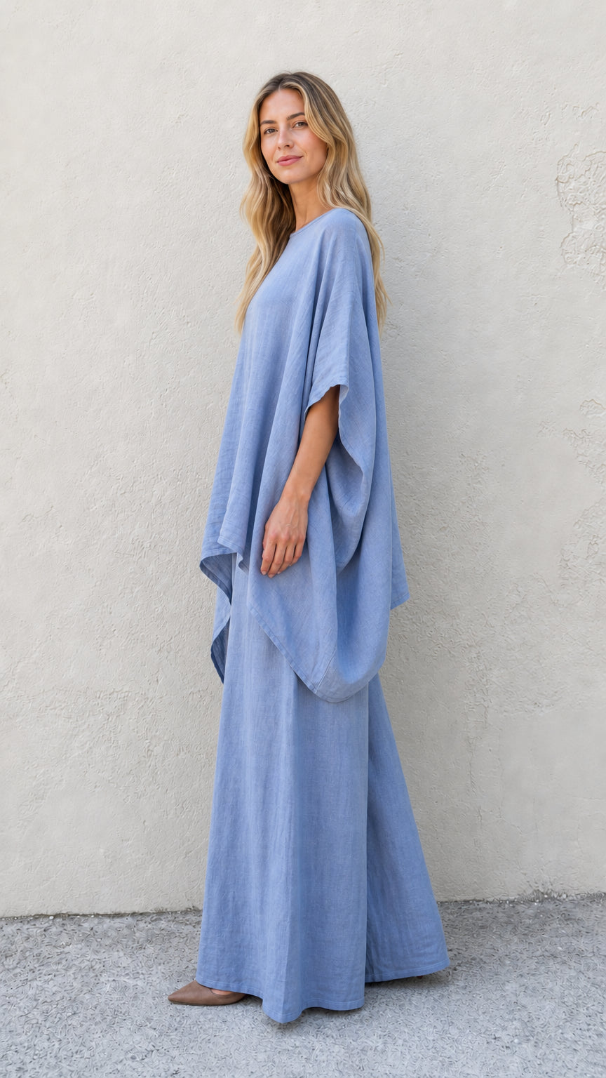 Side profile of woman in blue two-piece wide leg pant set