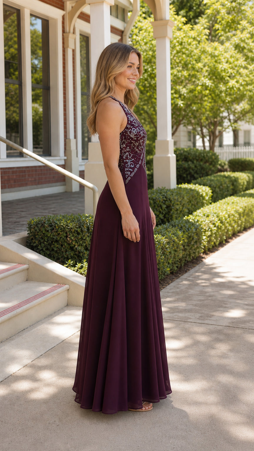 Side profile view of burgundy evening dress