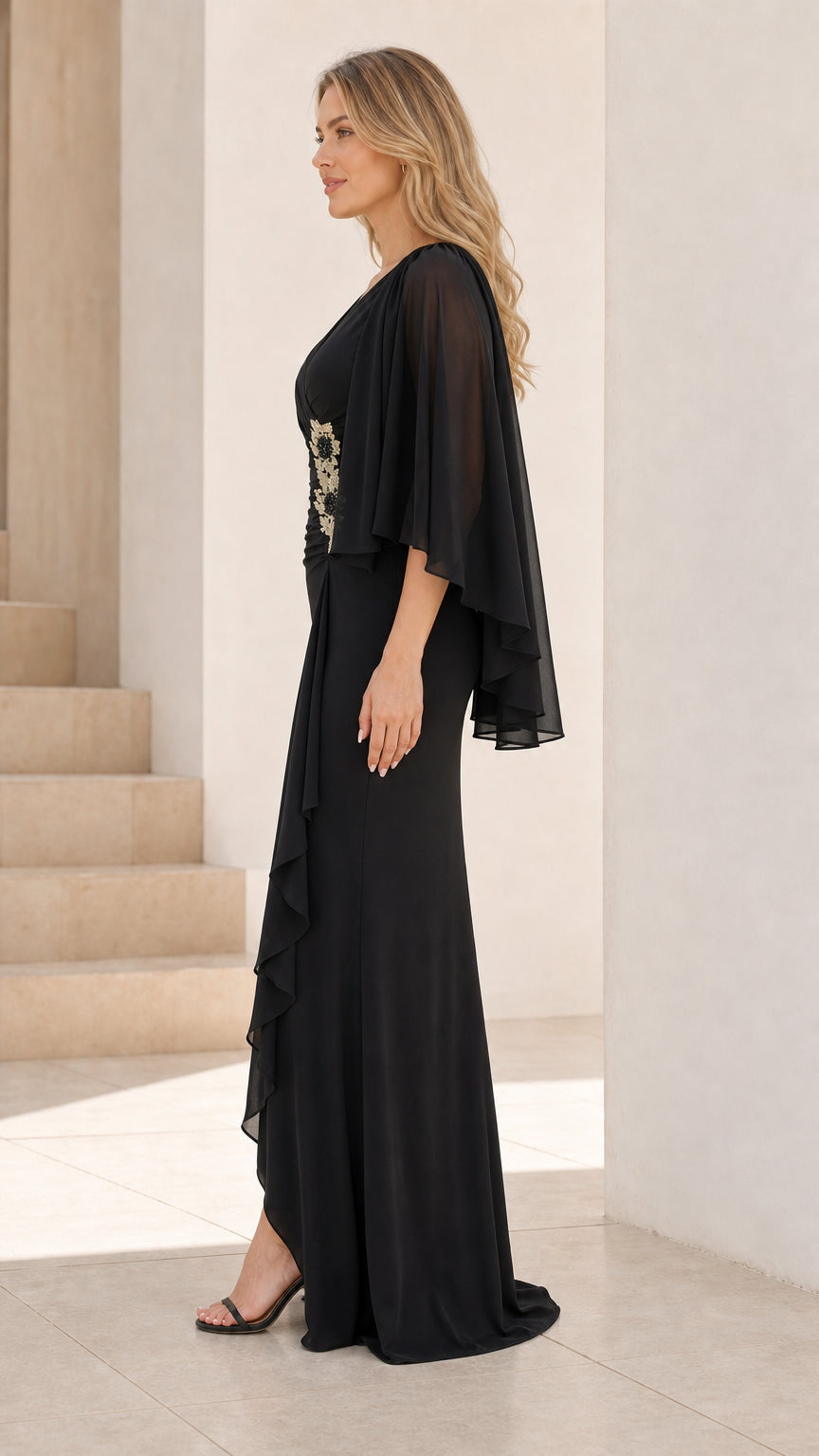 Side profile of black evening gown with split hem