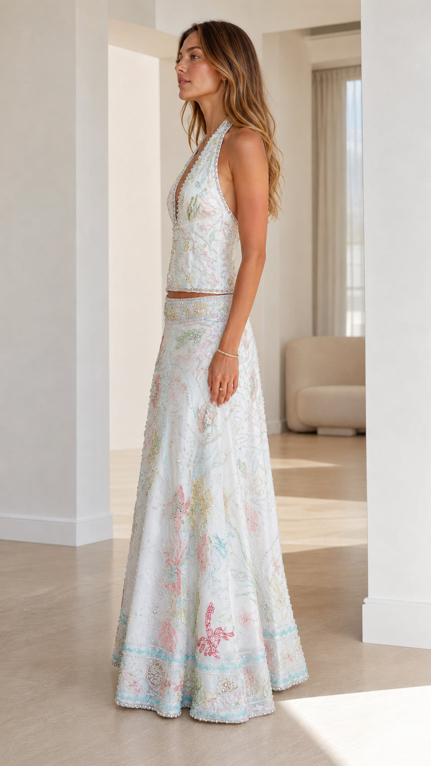 Side profile of woman in white two-piece embroidered set