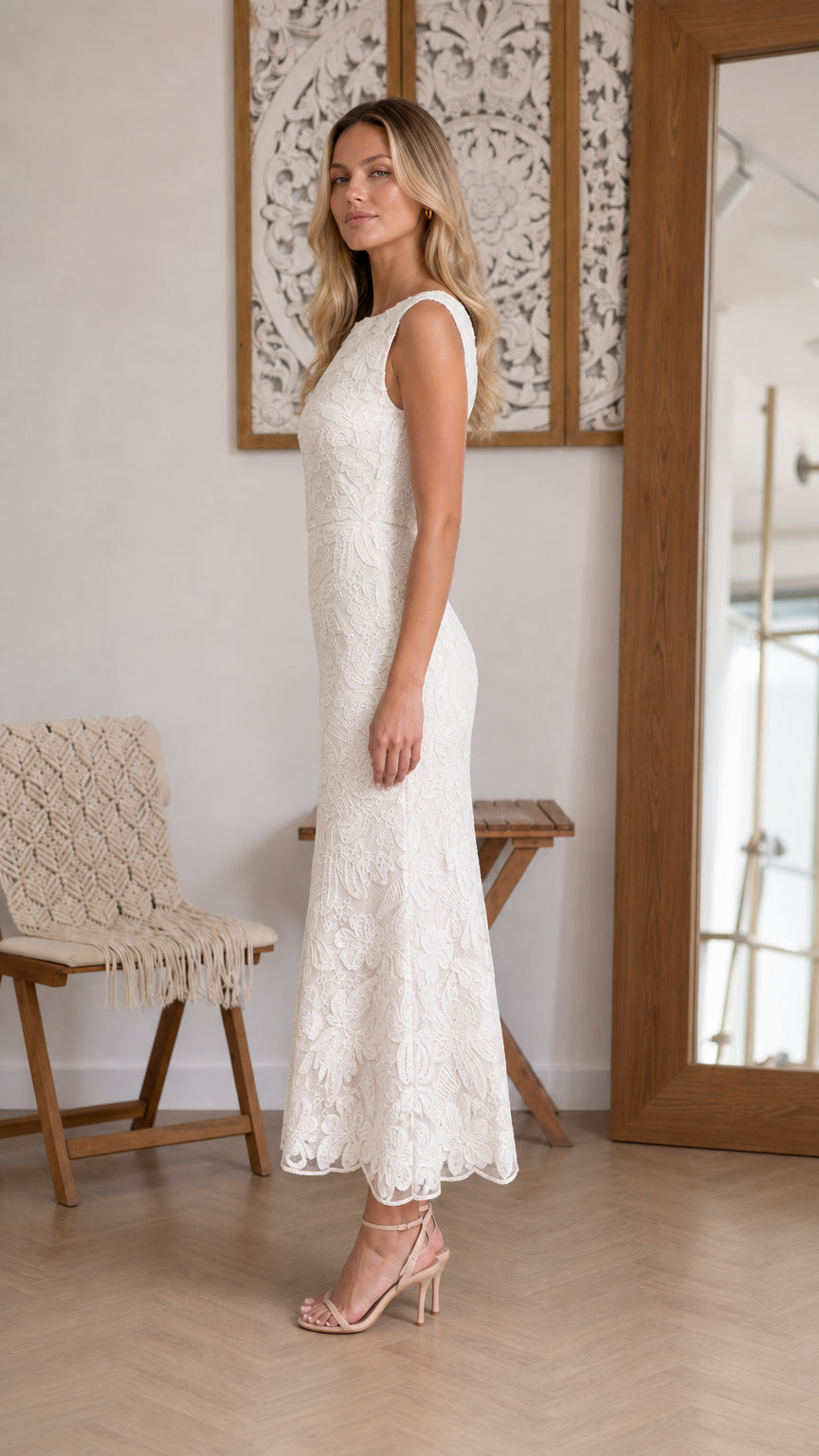 Side profile view of White lace dress