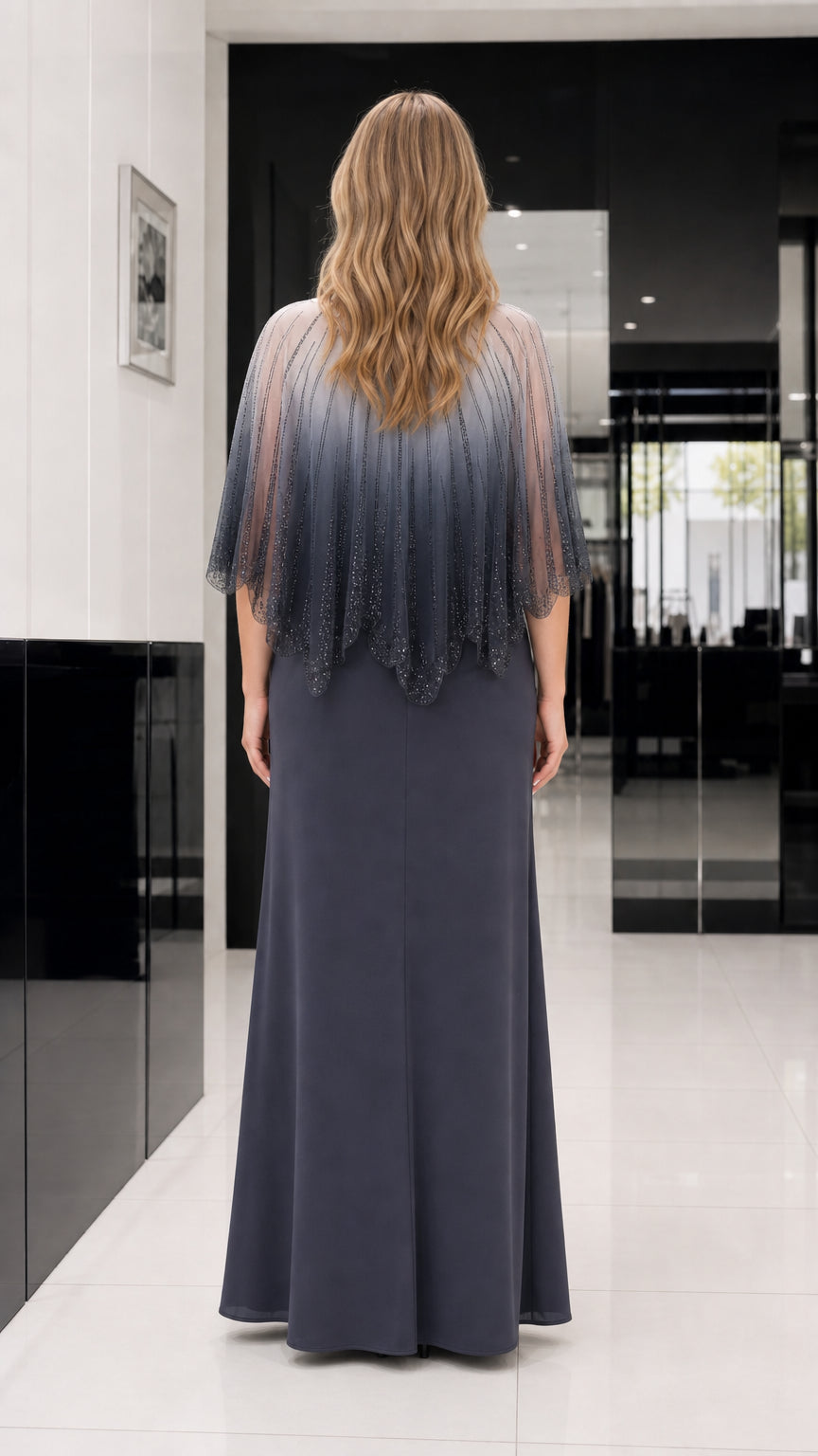 Back view of charcoal grey formal capelet dress