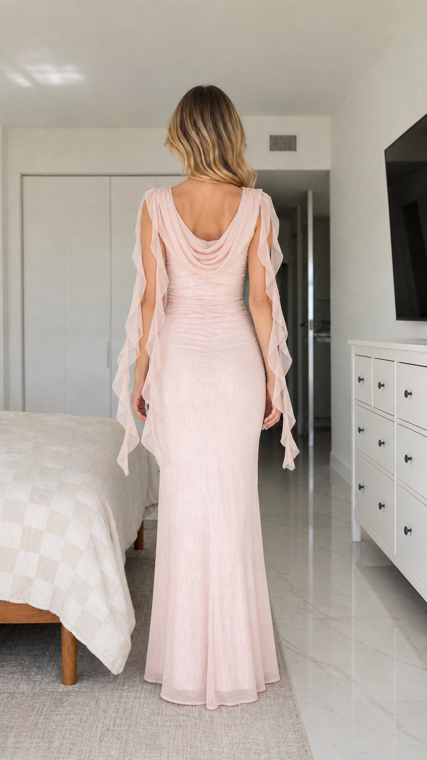 Back view showcasing cowl back detail on pink dress