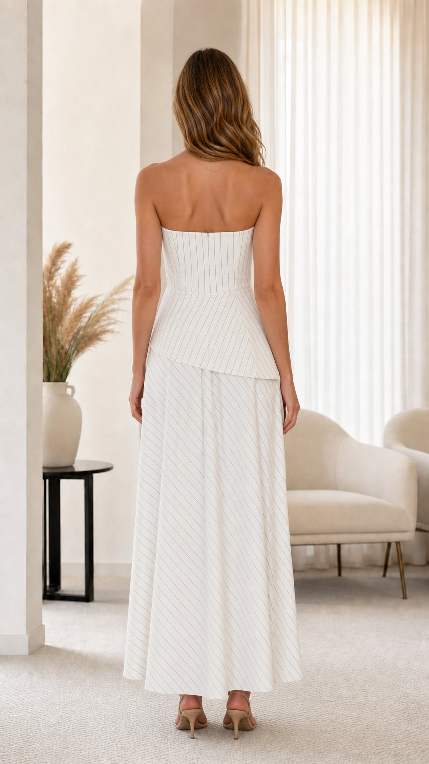 Back view of white two-piece set showing clean tailoring
