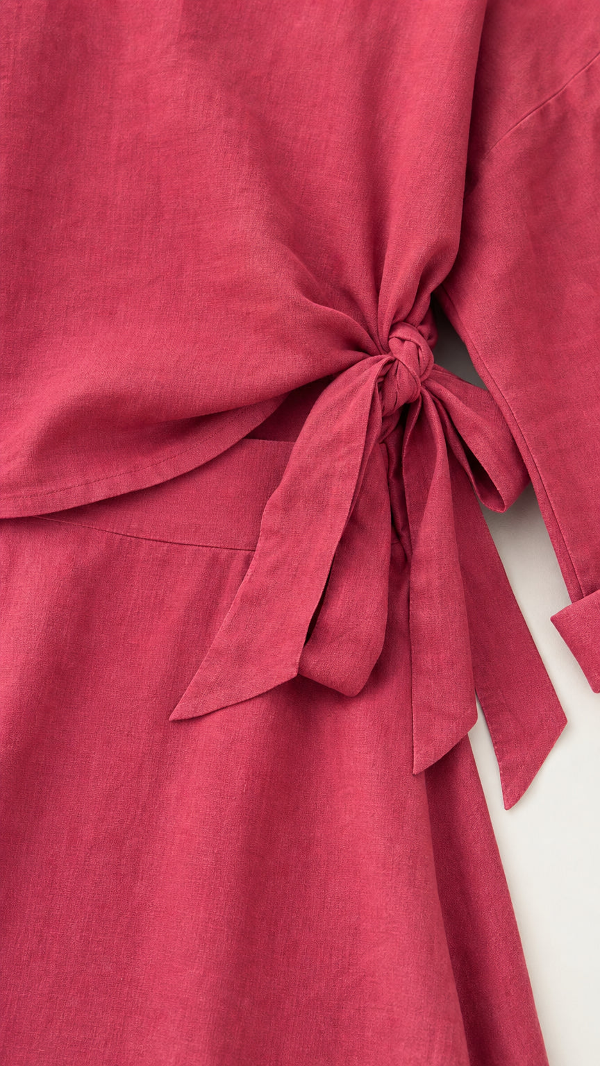 Close-up detail of the adjustable side knot on the top