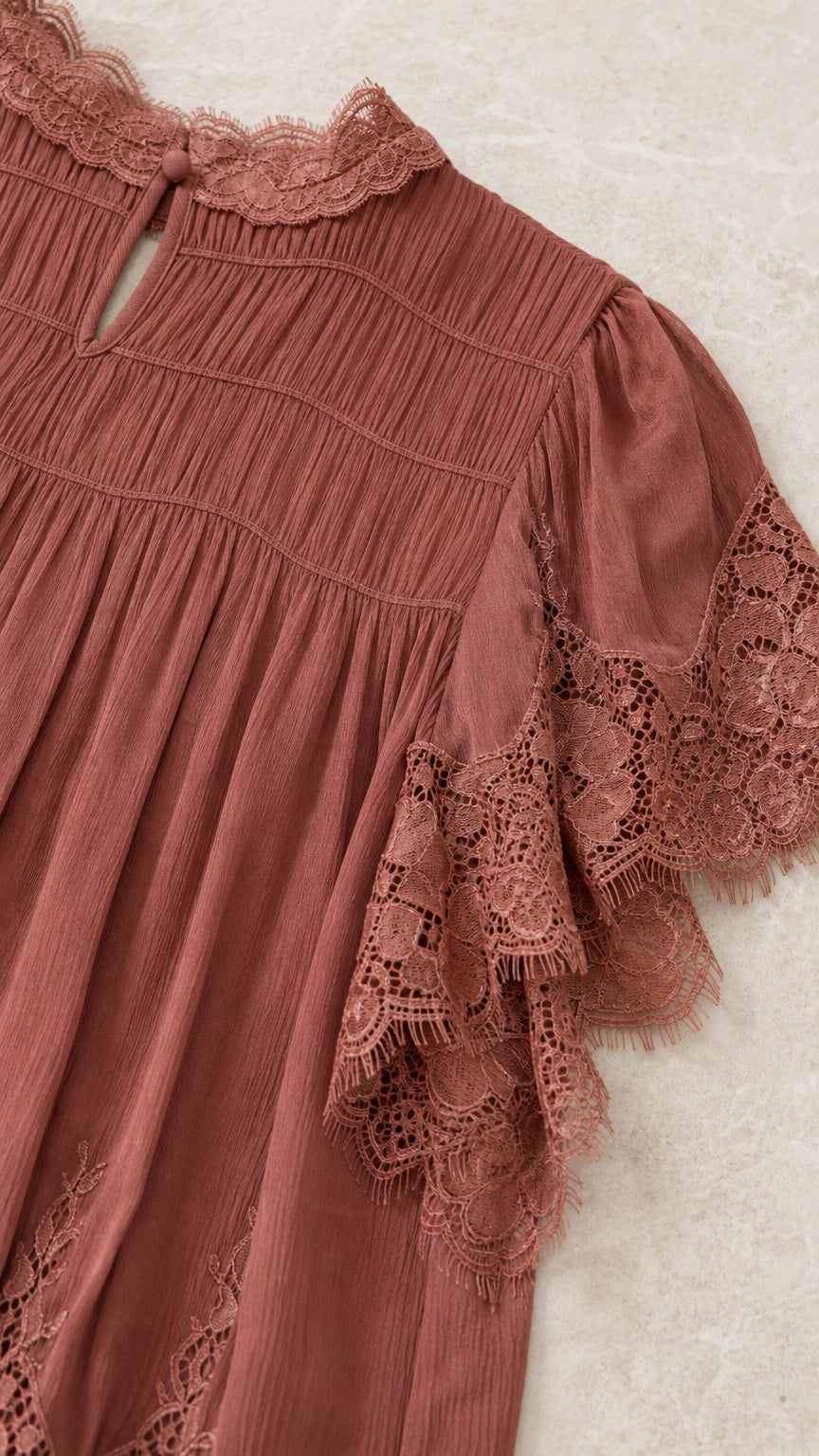 Close up of lace trim detail on Dusty Rose top