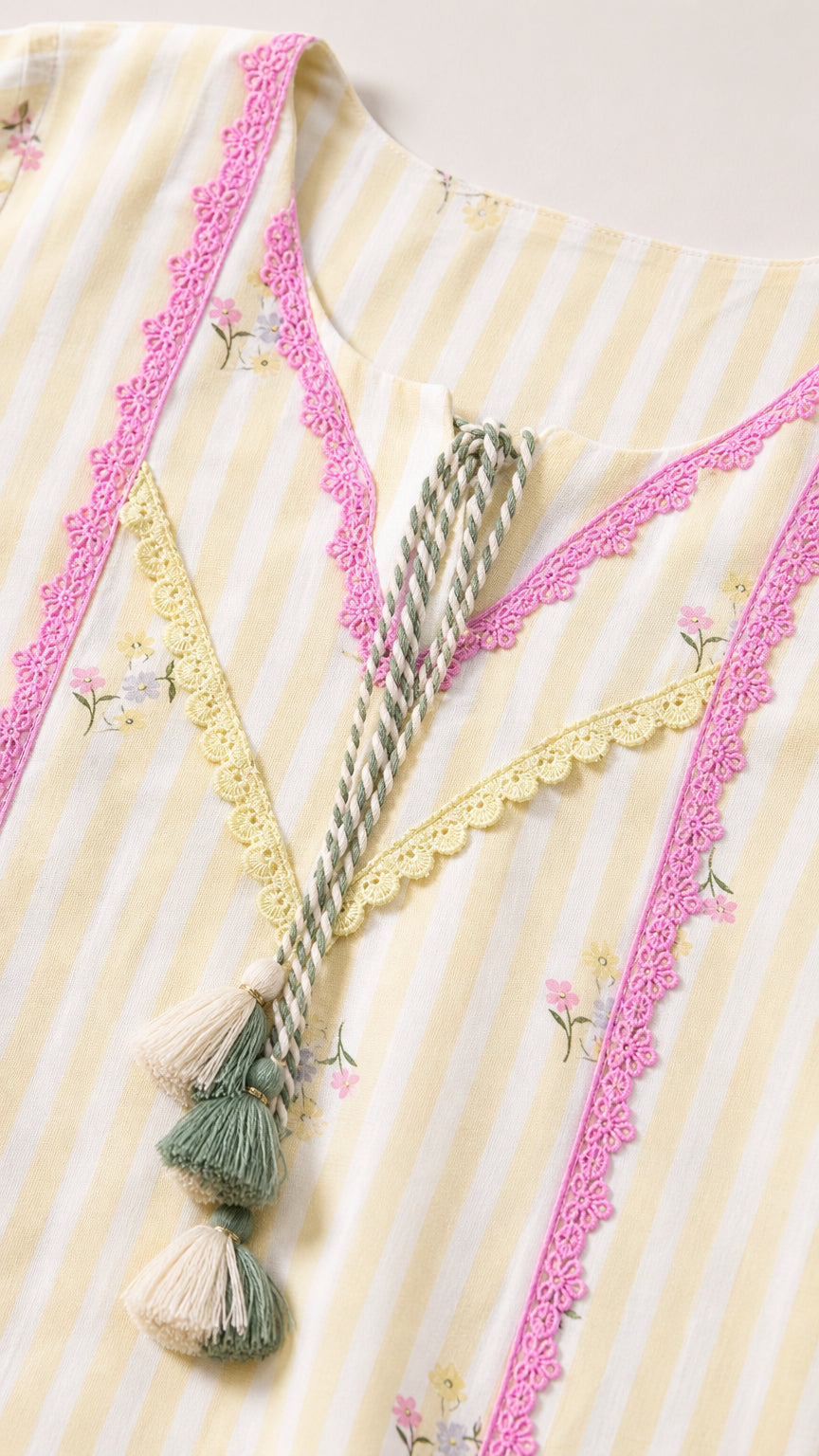 Close-up detail of neckline, lace trim, and tassels on yellow kurti