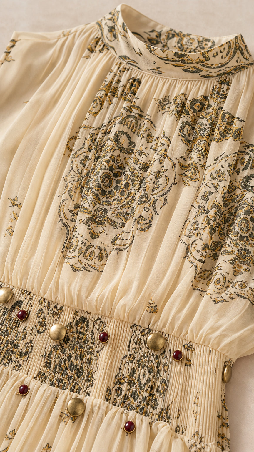 Close up of high neckline and embellished waist of the dress