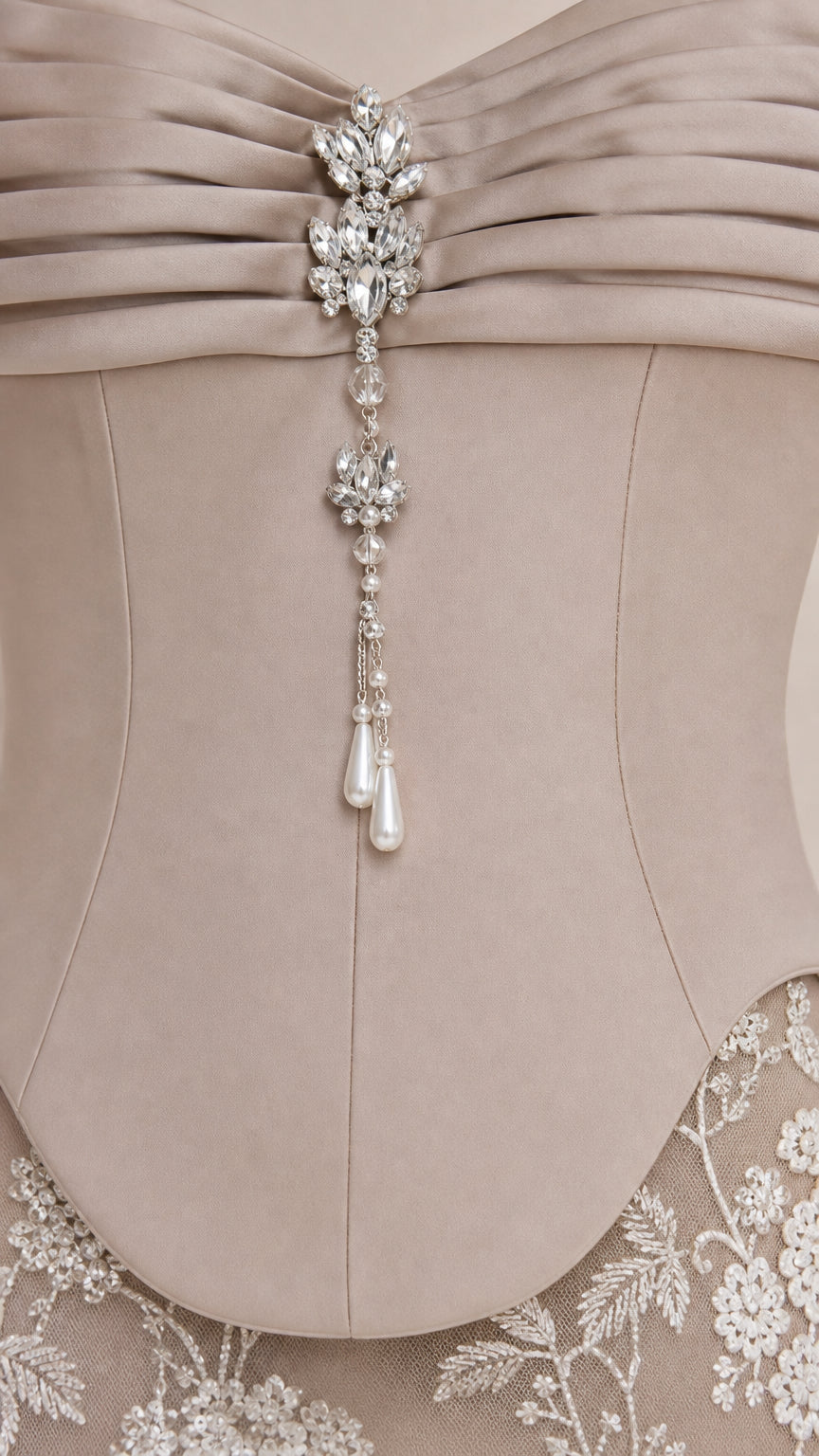 Close up of crystal and pearl embellishment on bodice