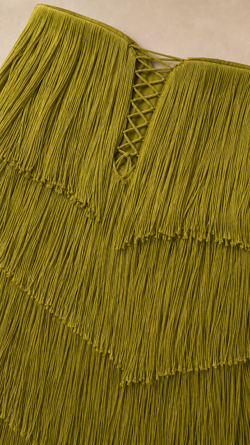Close-up of olive green fringe fabric and lace-up back construction