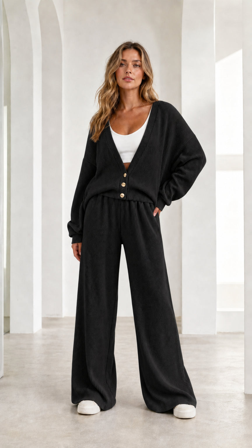 Woman wearing black ribbed knit lounge set