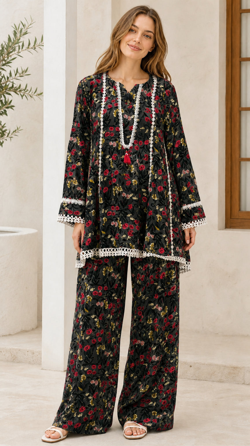 Model wearing black floral two-piece set