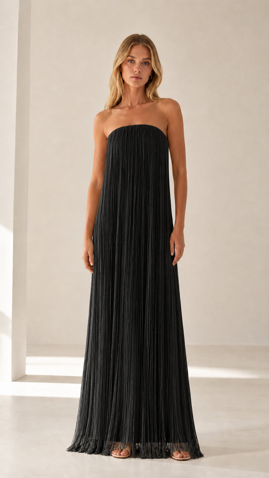 Model wearing black strapless pleated maxi dress