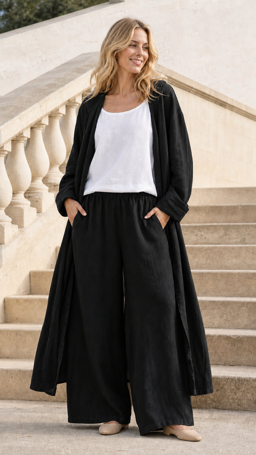 Model wearing Black hooded long cardigan and wide-leg pants set