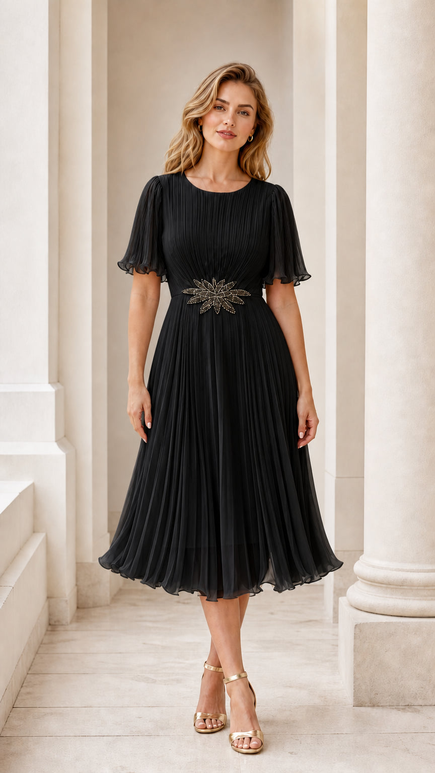 Front view of model wearing the black pleated midi dress