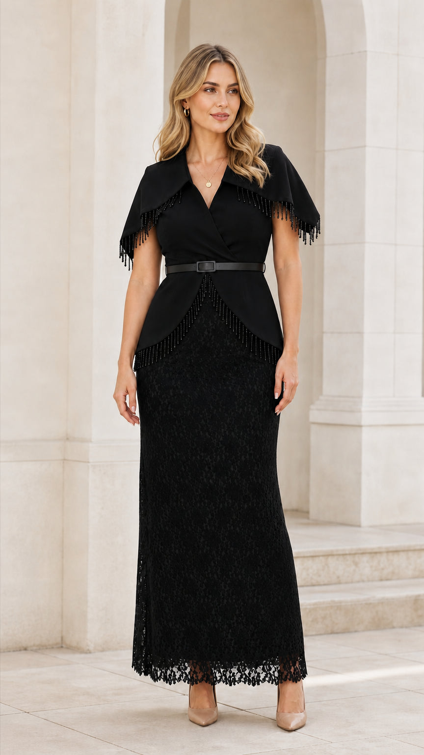 Front view of woman wearing black cape overlay lace evening dress