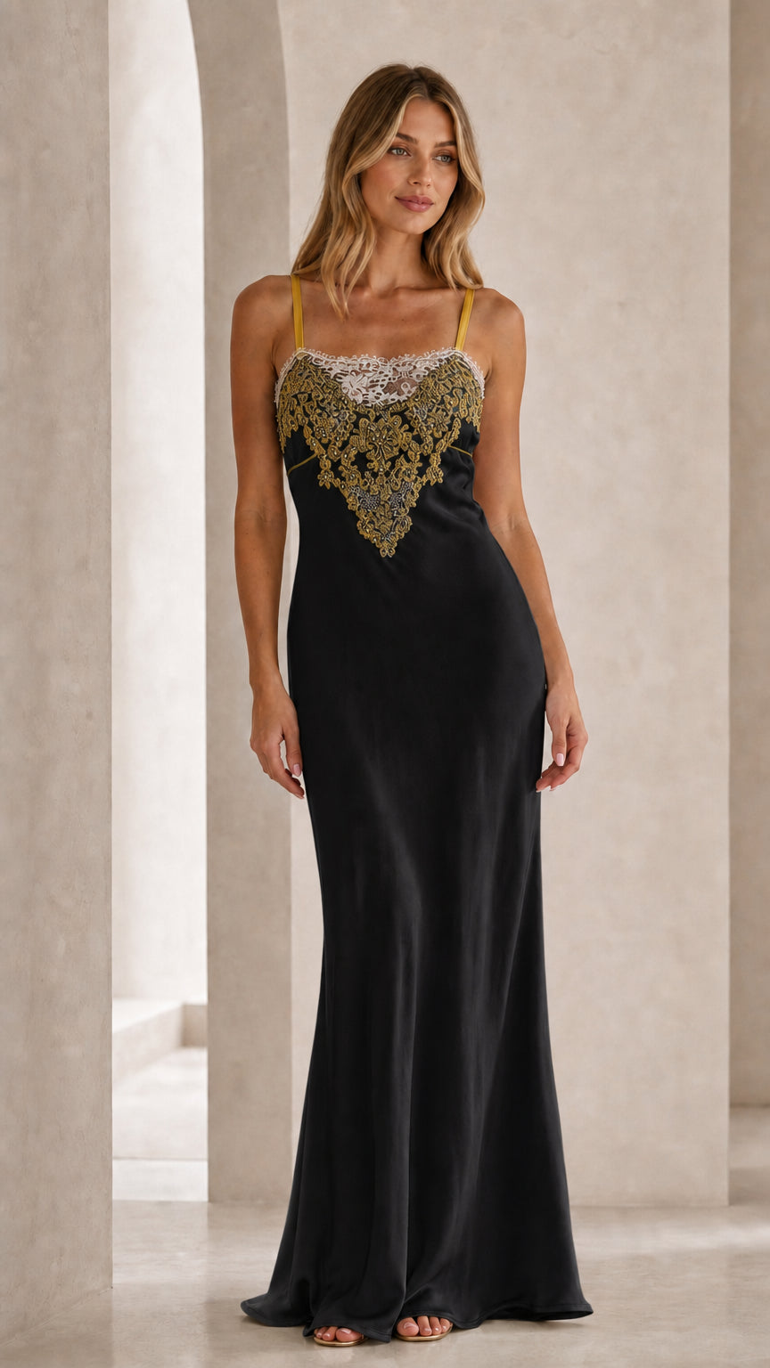 Front view of black satin slip maxi dress with embroidered bodice