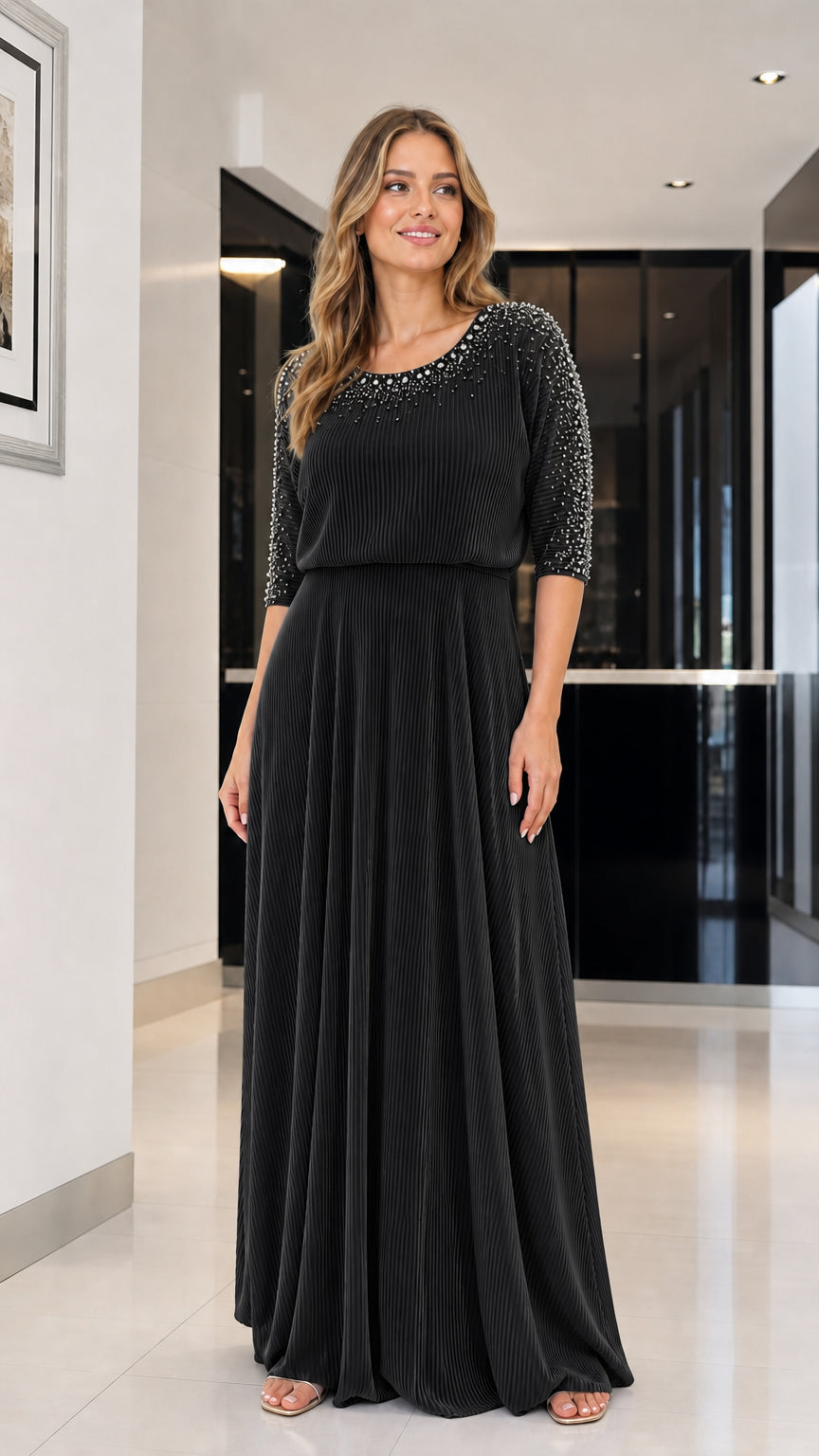 Model wearing black beaded pleated maxi dress