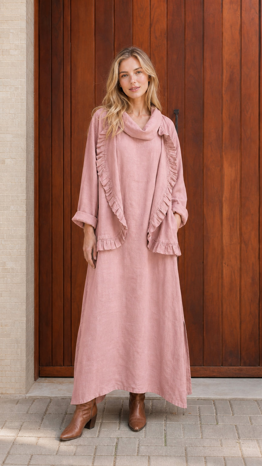 Model wearing dusty pink ruffled cowl neck top and maxi skirt set