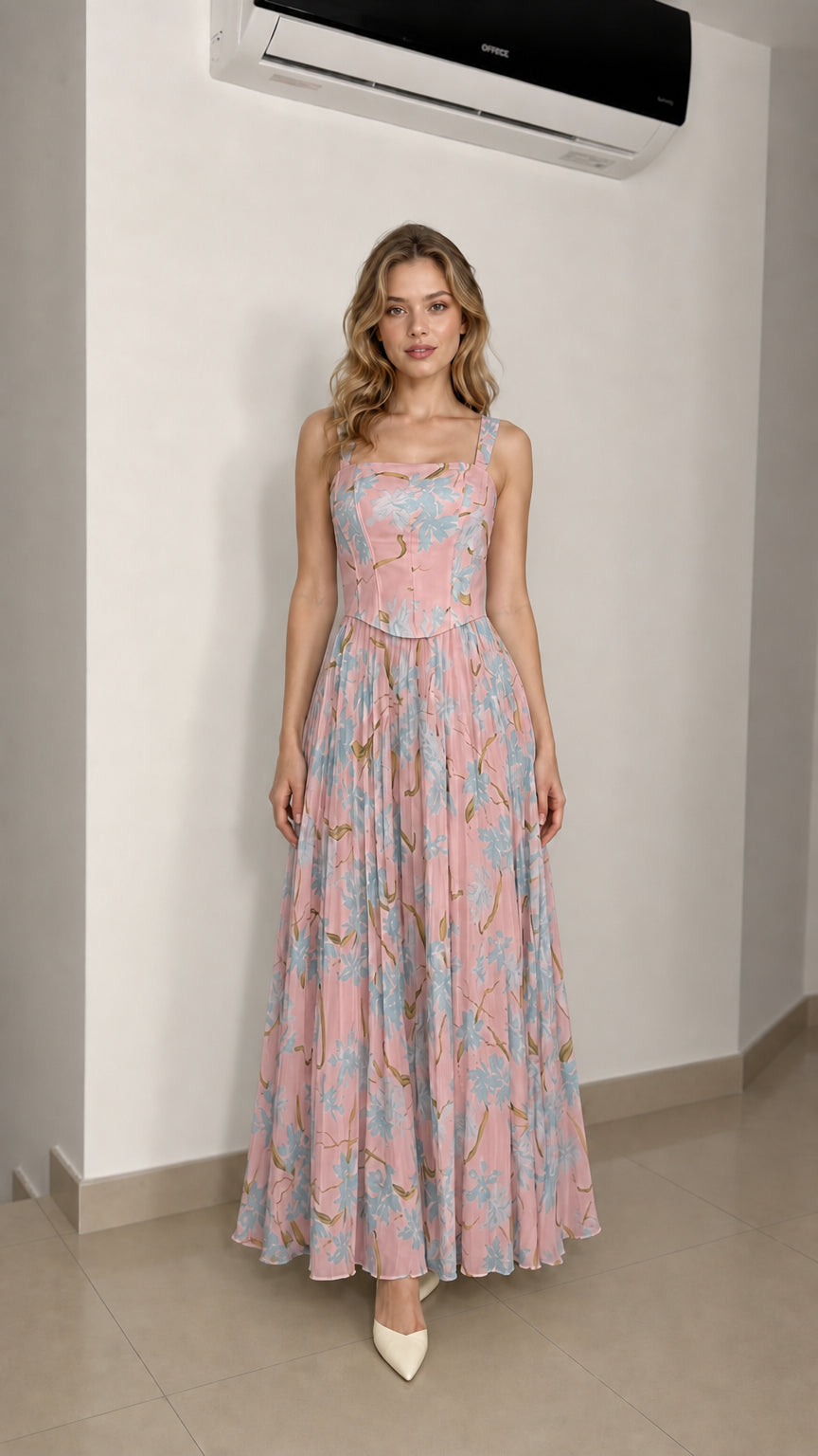 Model wearing pink floral maxi dress