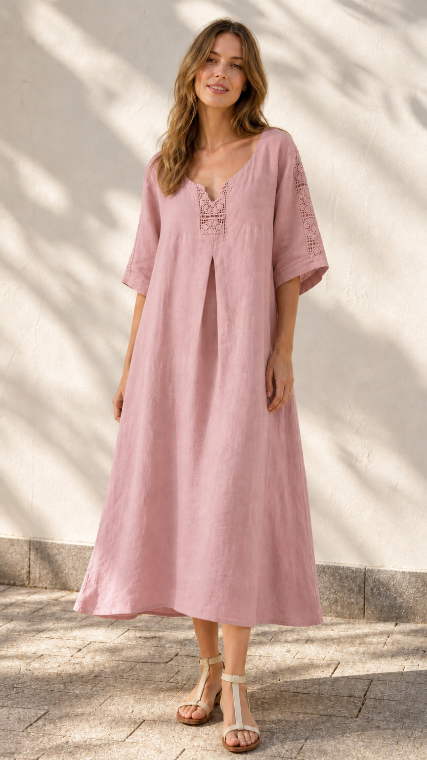 Front view of model wearing pink midi dress
