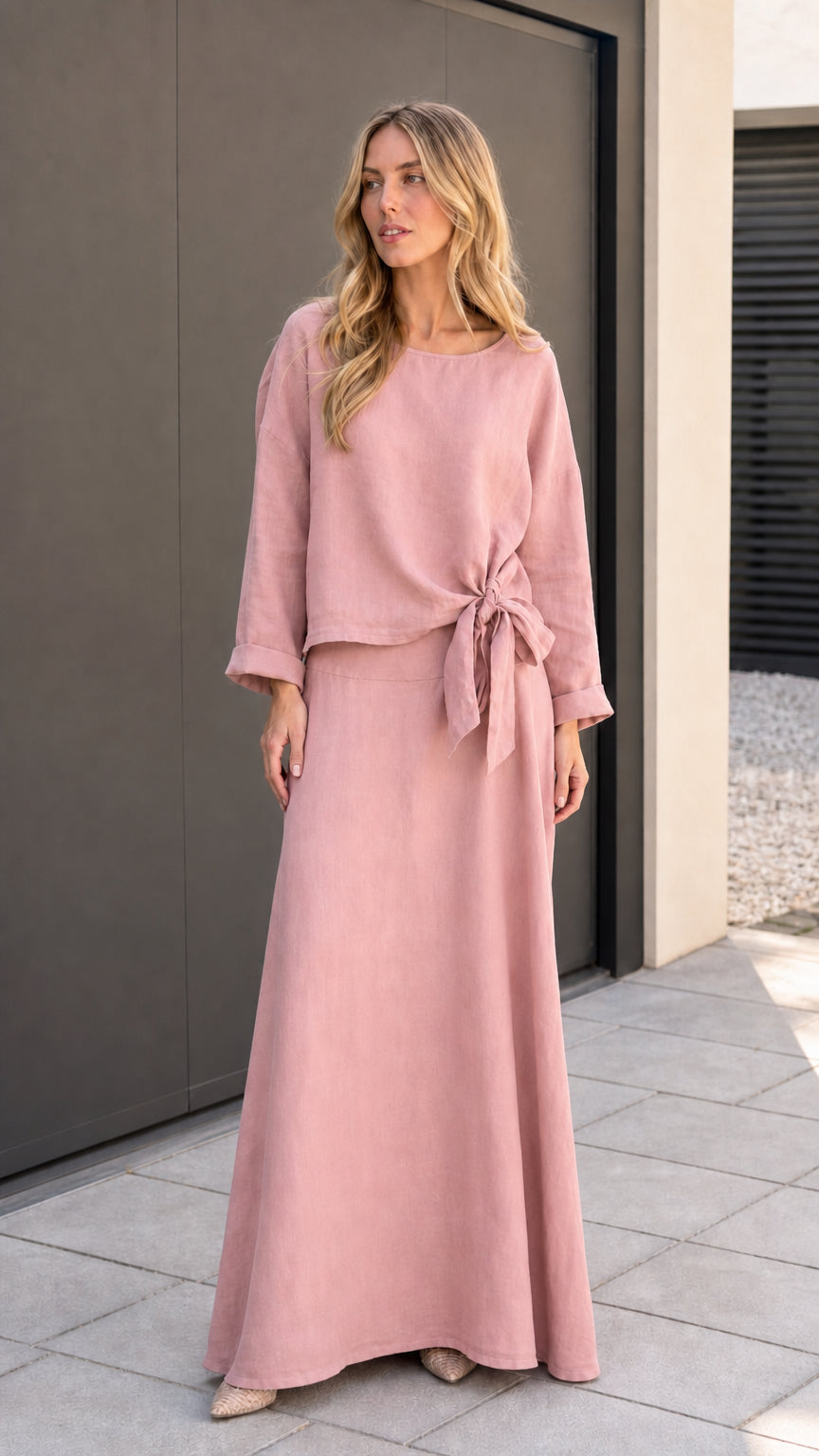 Model wearing dusty pink two-piece matching set