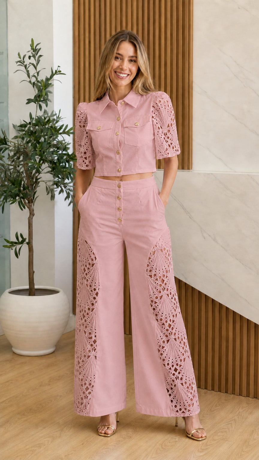 Model wearing pink eyelet crochet two-piece set