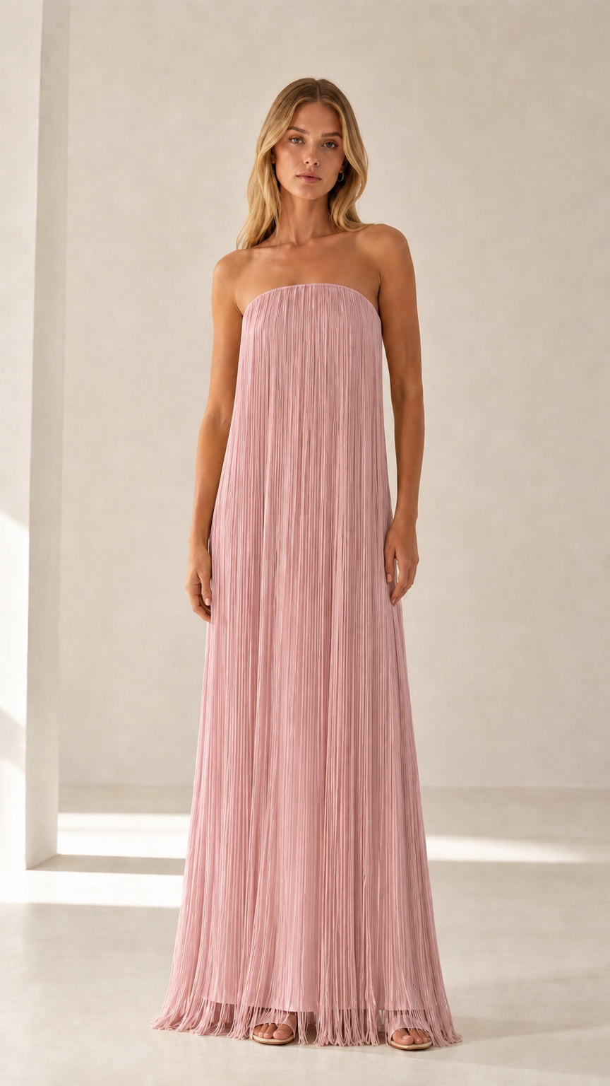 Model wearing pink strapless pleated maxi dress