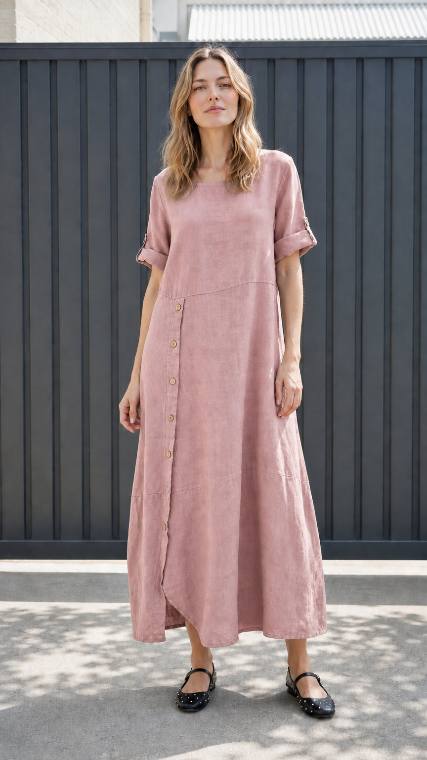 Front view of pink asymmetrical button-front maxi dress