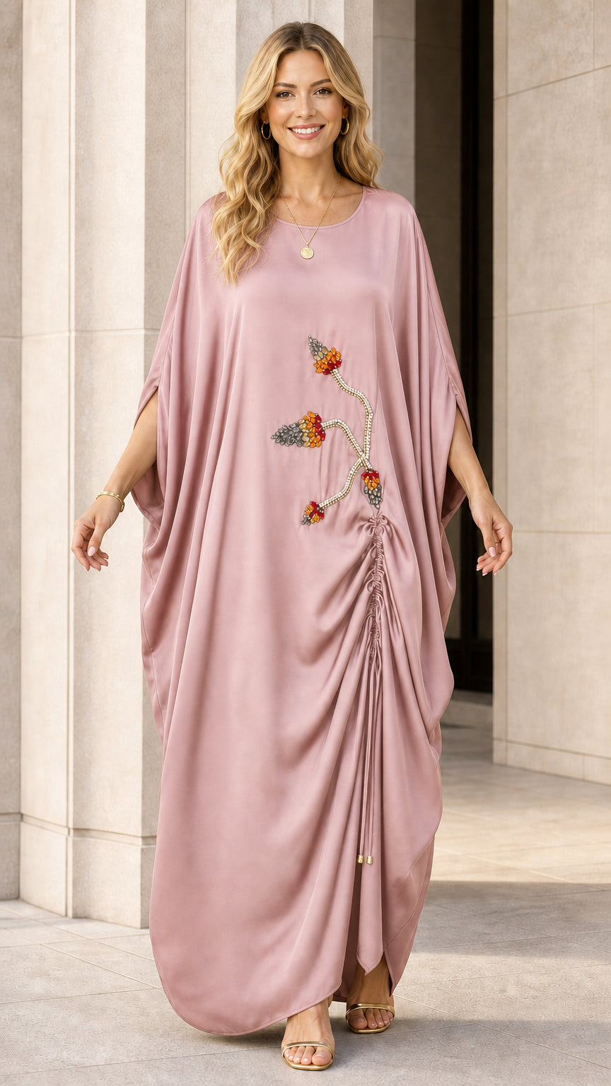 Model wearing dusty rose kaftan maxi dress