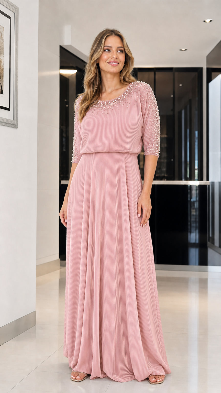 Model wearing pink beaded pleated maxi dress