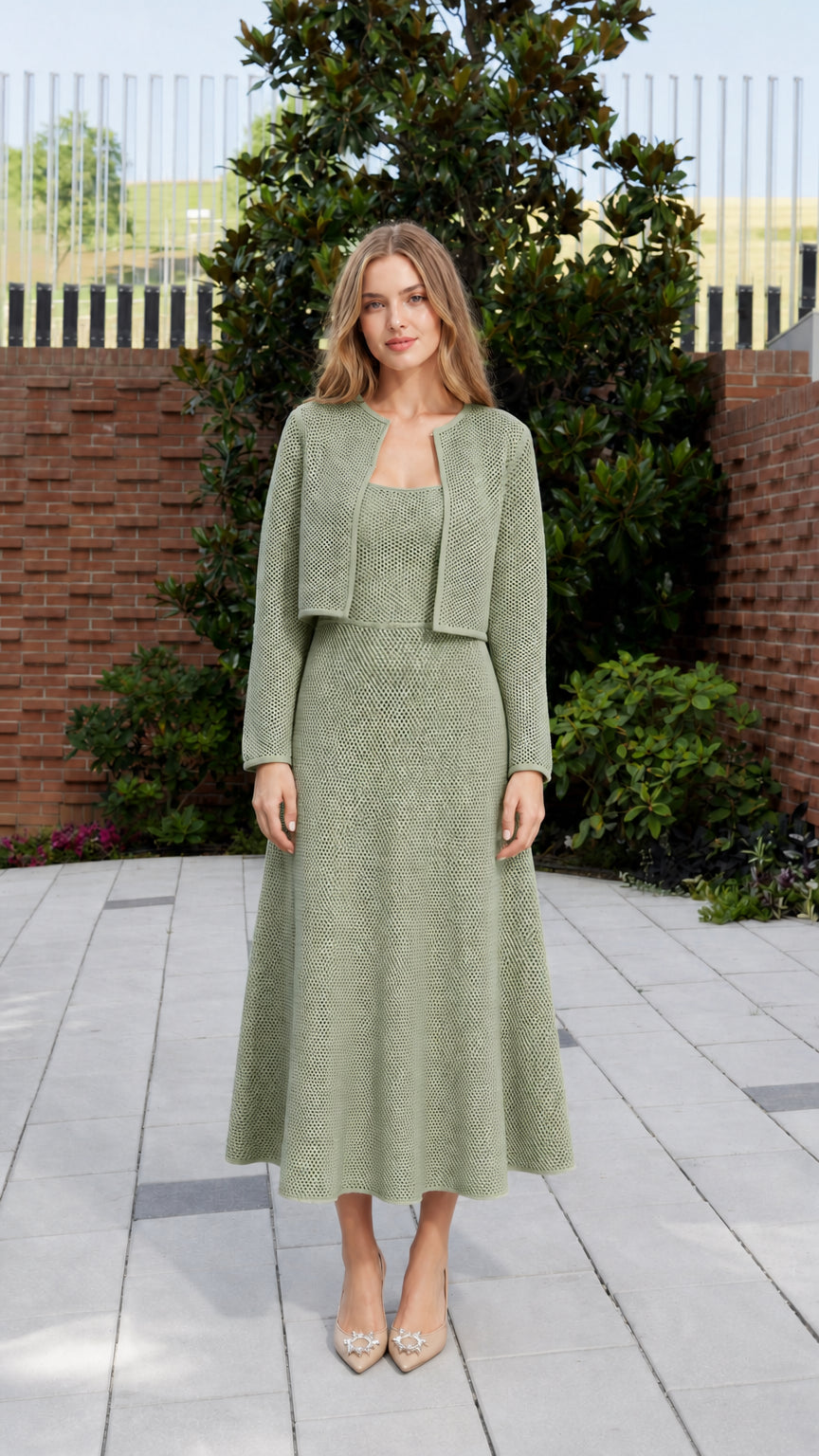 Full front view of model in sage green knit matching set