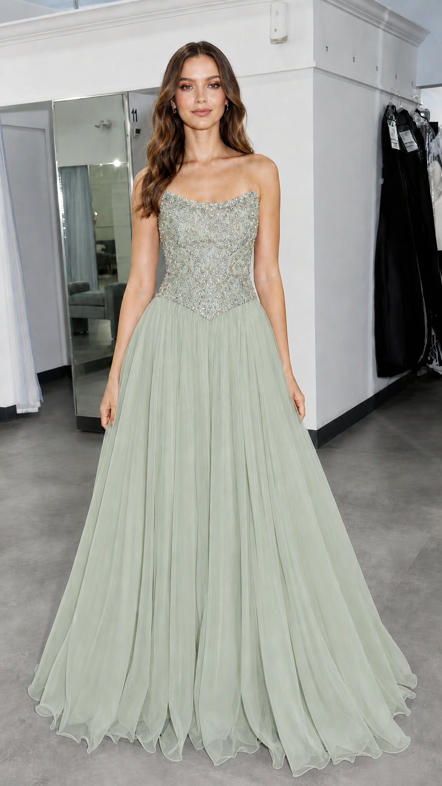 Front view of model wearing sage green formal gown