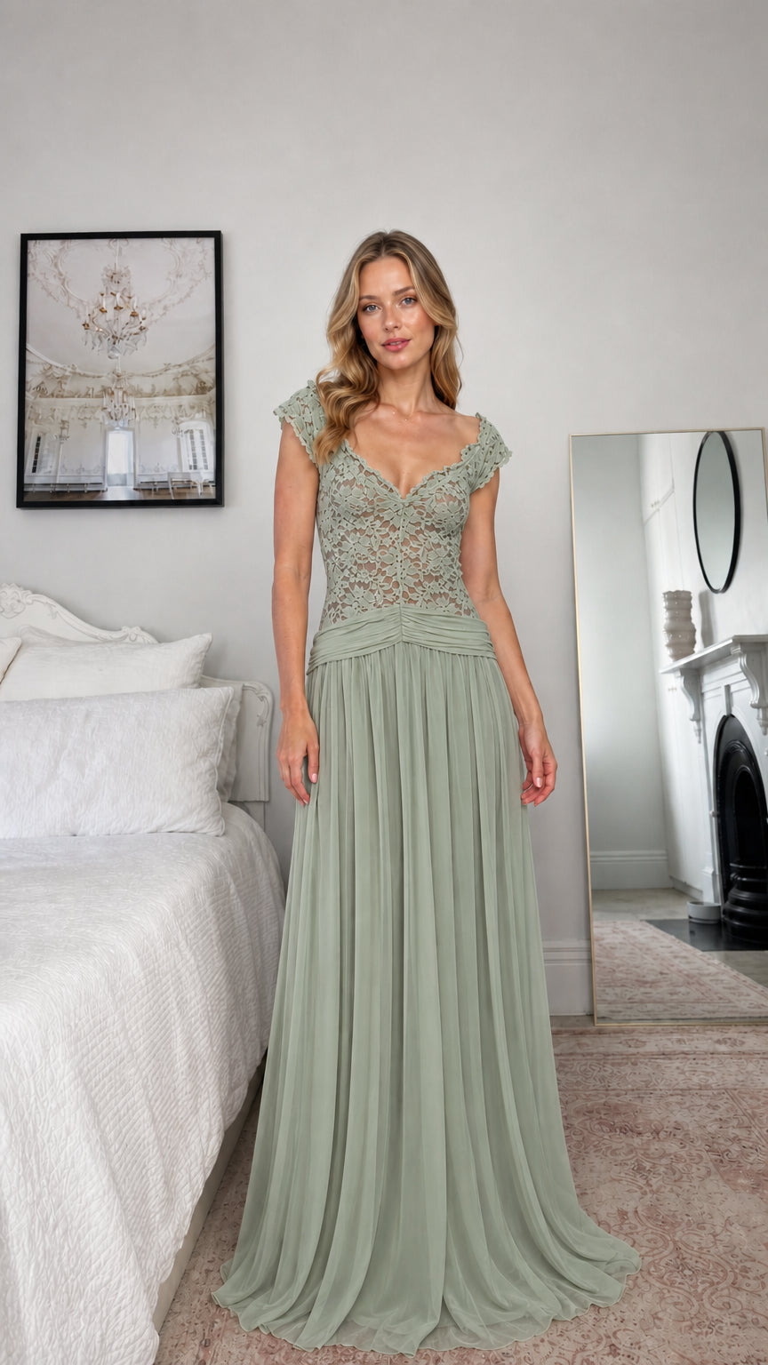 Front view of model wearing sage green lace evening dress