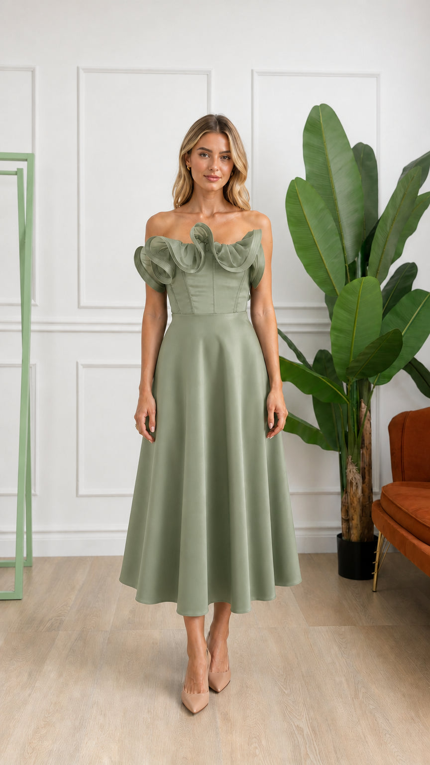 Front view of woman wearing sage green off-shoulder ruffle corset midi dress