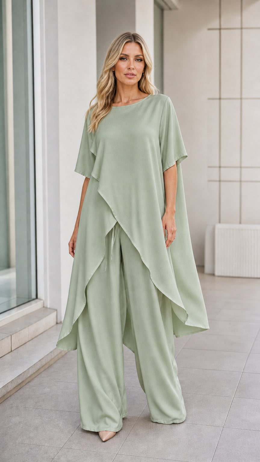 Model wearing sage green asymmetric tunic and wide-leg pants set