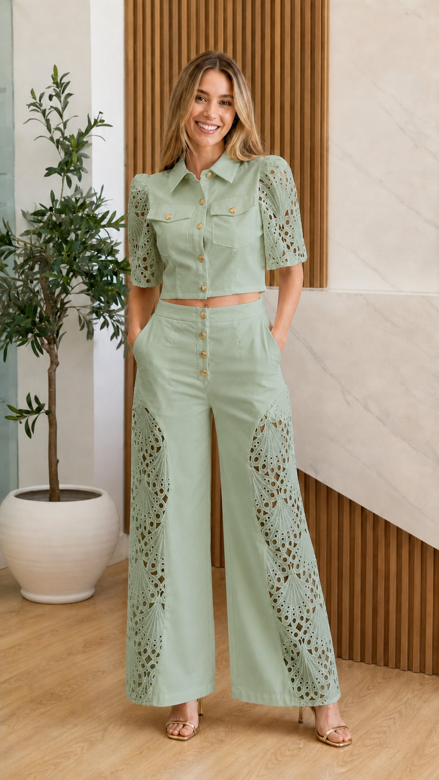 Model wearing sage green eyelet crochet two-piece set
