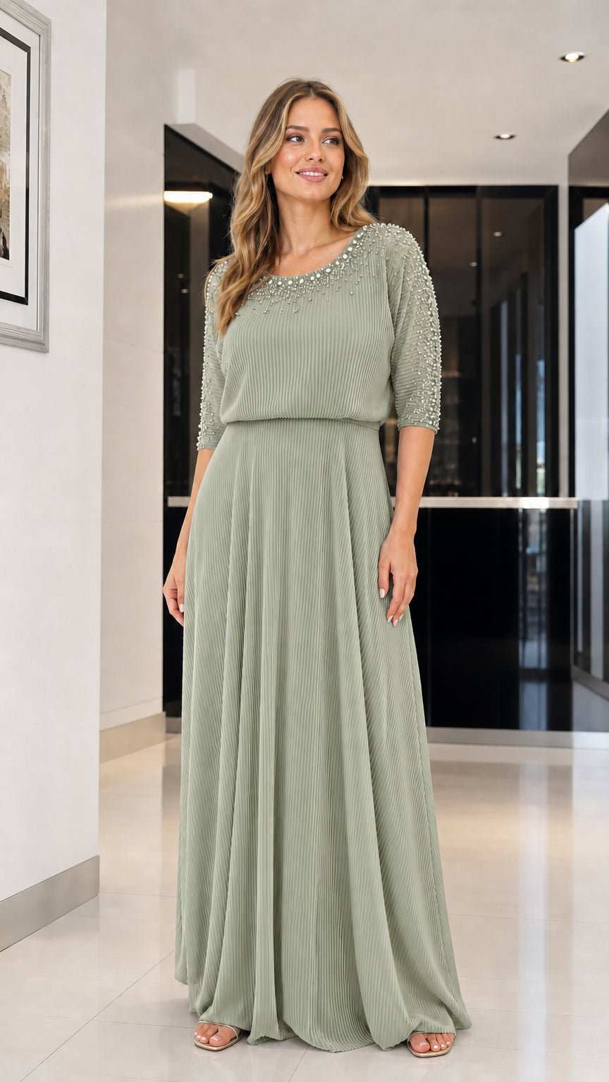 Model wearing sage green beaded pleated maxi dress