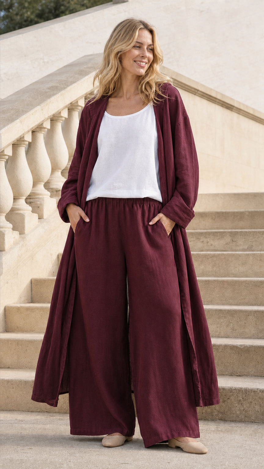 Model wearing Burgundy hooded long cardigan and wide-leg pants set