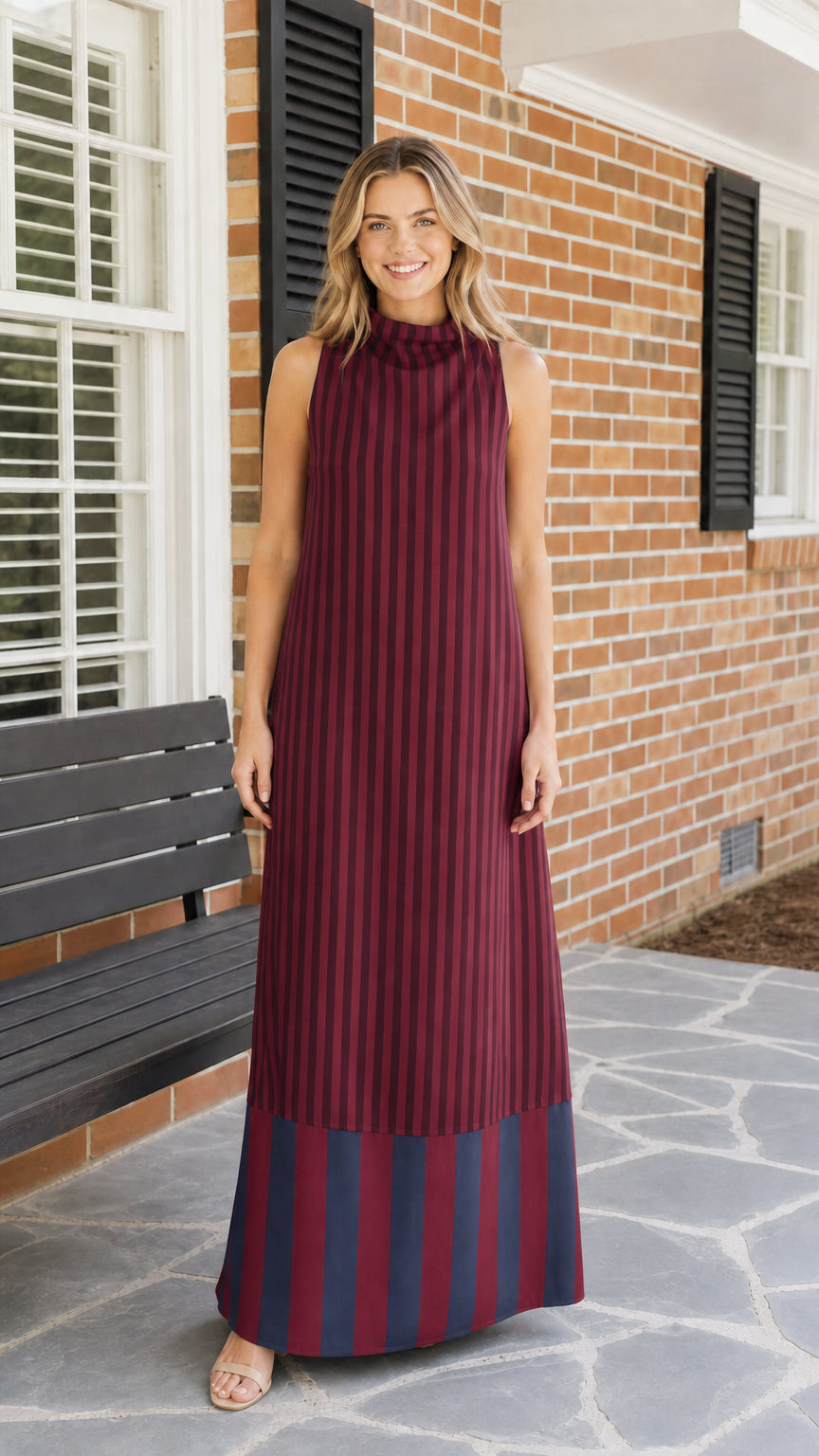 Woman wearing burgundy striped maxi dress